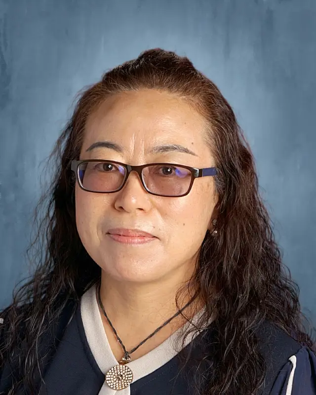 Mme. Yan Hua Zhang